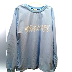 Solumbra women's Spf blue hibiscus flower print pullover. (L)